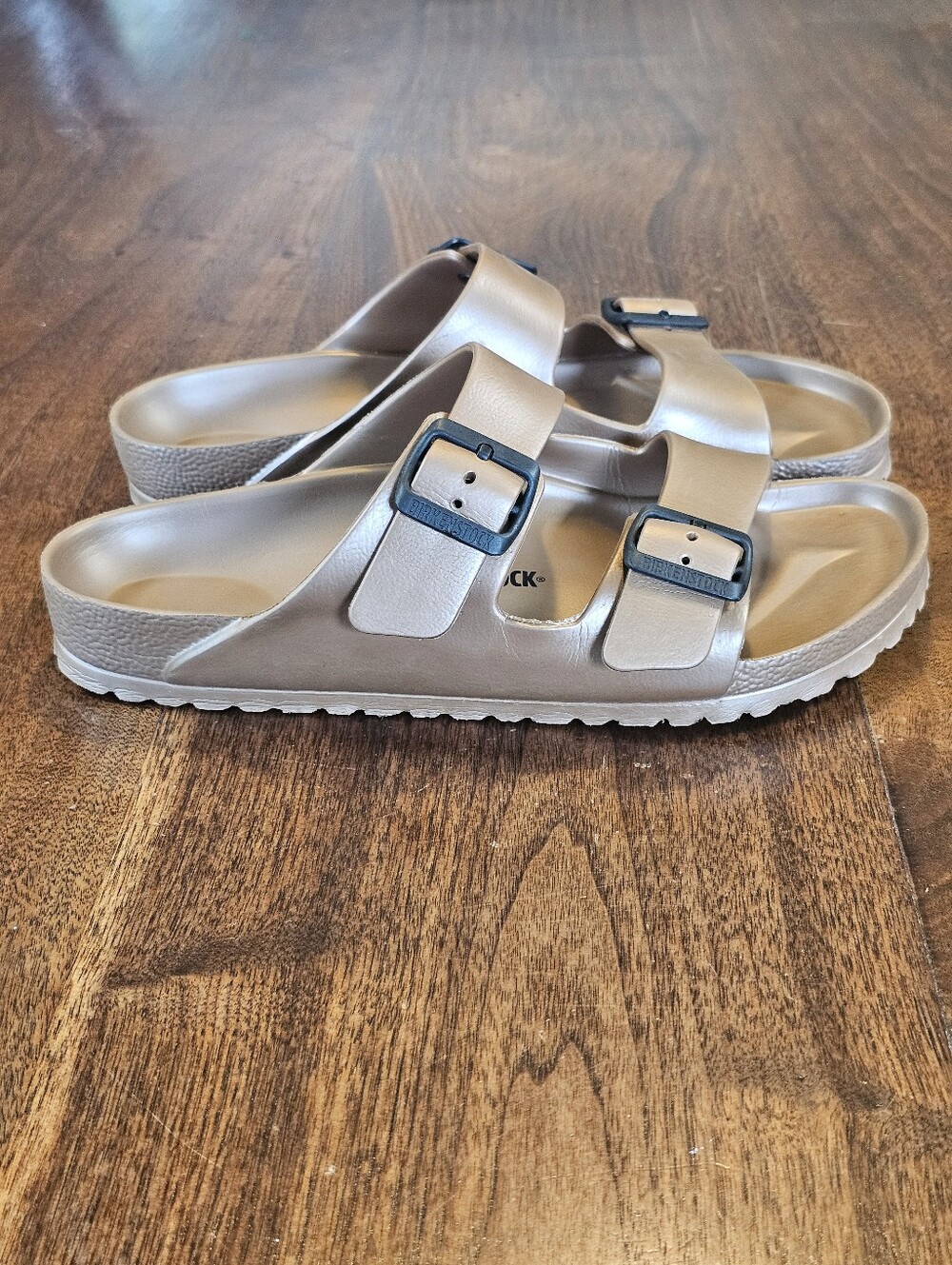 Birkenstock Arizona EVA Sandals In Metallic Bronze Size 41